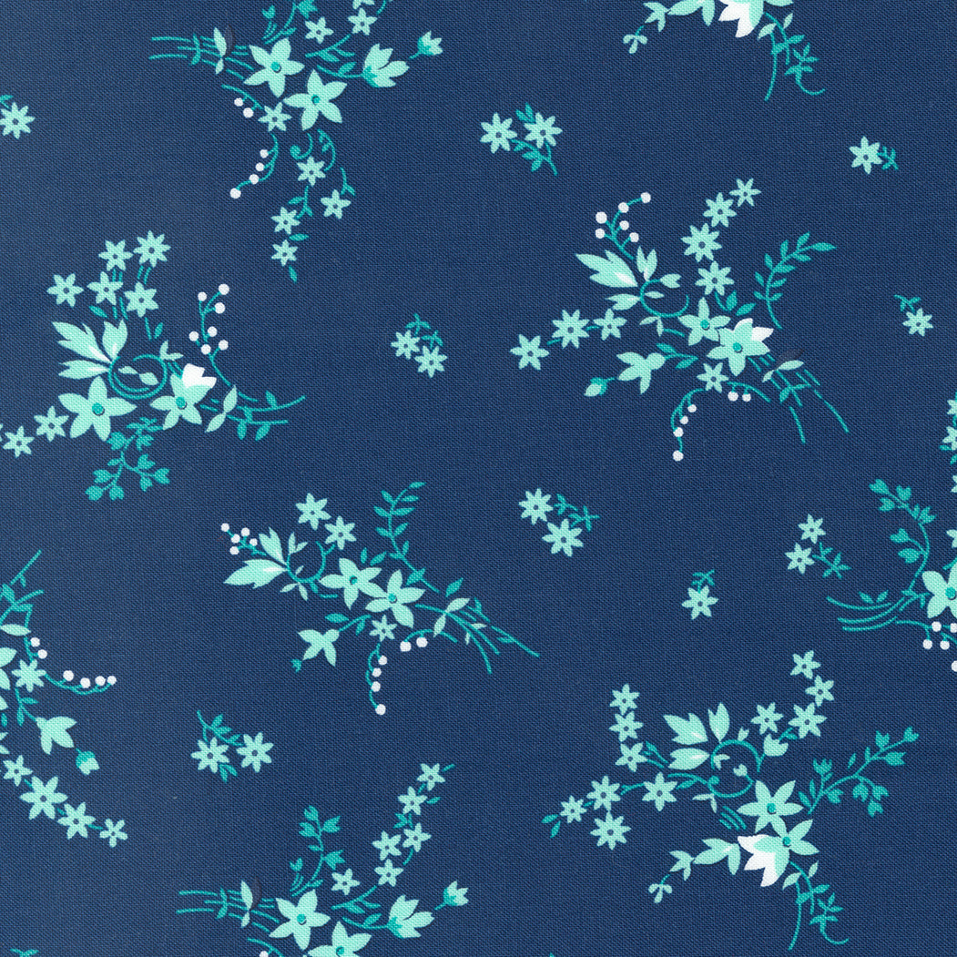 Aqua green flowers on a dark blue background