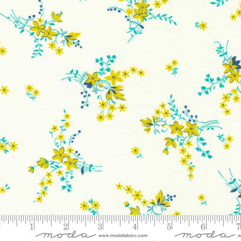 Yellow flowers with aqua green petals on a cream background