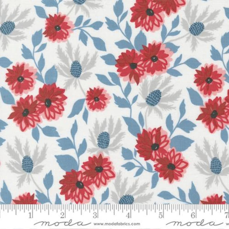 white fabric with red flowers and blue leaves